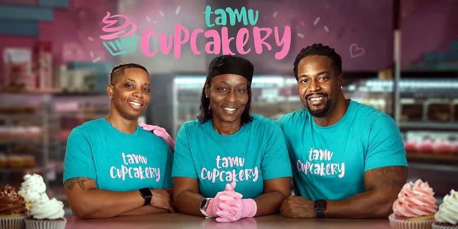 The Tamu Cupcakery owners in front of the shop