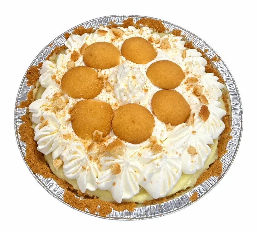 Banana Cream Pie with whipped cream and vanilla wafers